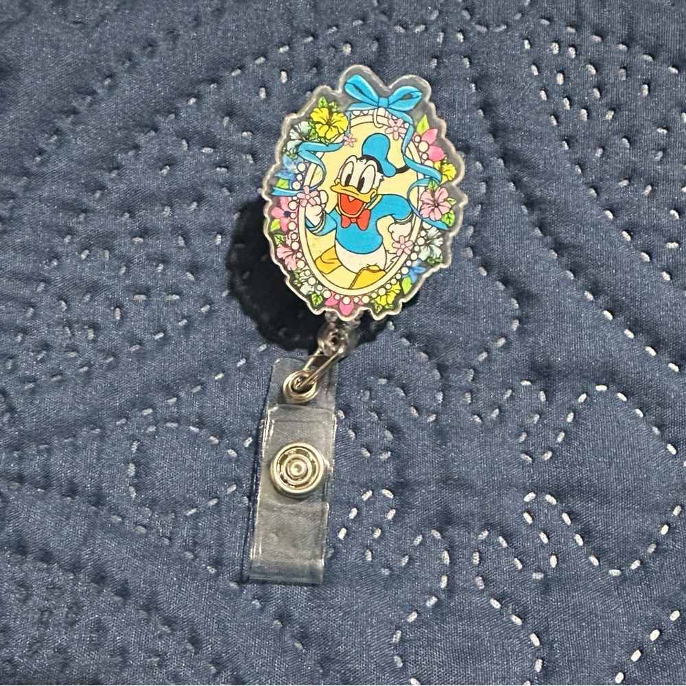 Blue and Yellow Cartoon Character Badge Reel